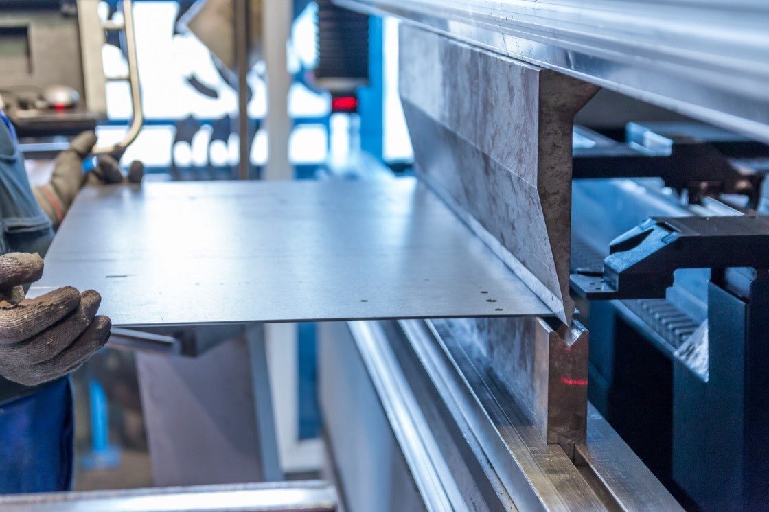 Custom sheet metal fabrication NJ: brake-formed trim bent to a drawing at the shop