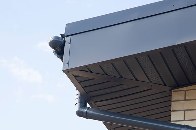 Vented and solid metal soffit and fascia panels formed in our East Orange shop